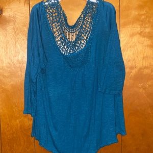Teal shirt with crocheted detail